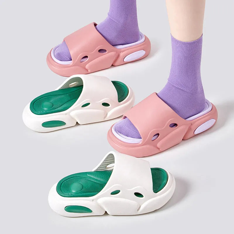 Women's two-colour EVA slippers with thick sole and leather lining in pink purple, shown on a foot.