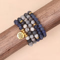 Blue patterned network stone beads on a multi-layer alloy bracelet in a natural style.
