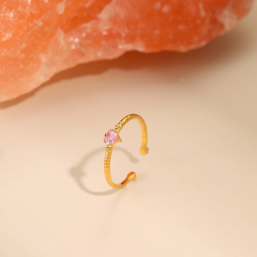 Adjustable open-ended stainless steel ring with heart-shaped zircon design in three colour options