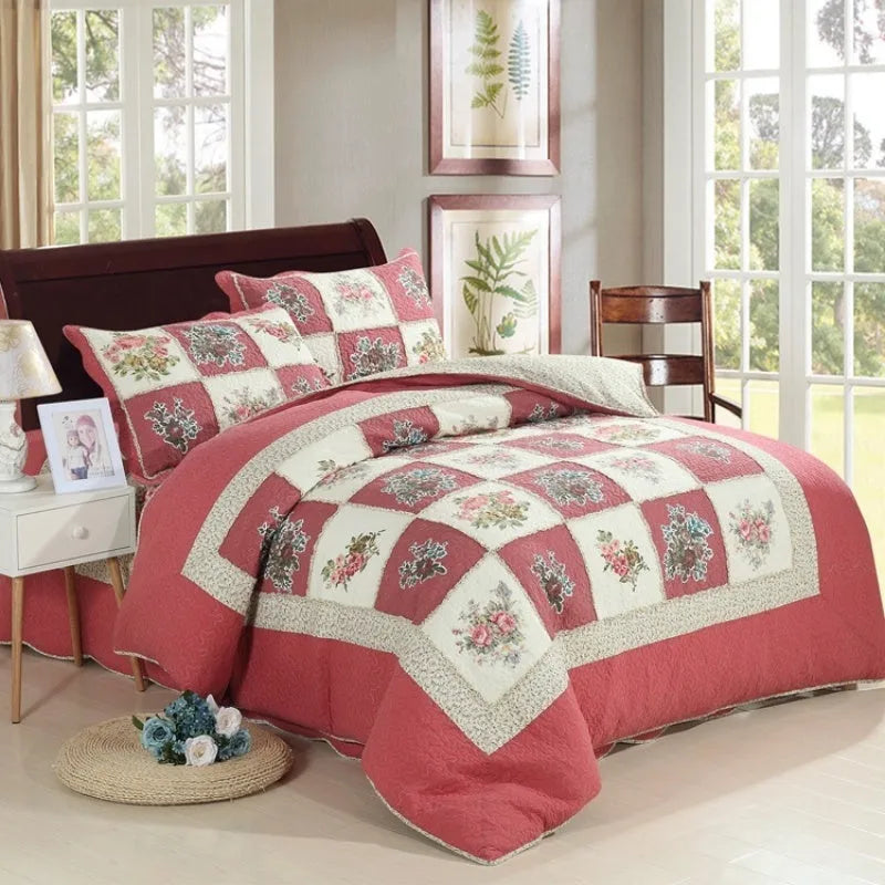 Pure cotton quilted bedspread three-piece set in a chosen pattern, showing the large bed cover and two matching pillowcases.
