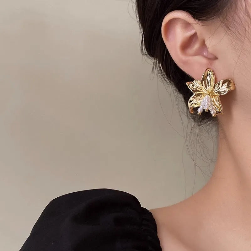 Gold H1795 personalised pearl flower earrings with exaggerated design and Seiko treatment