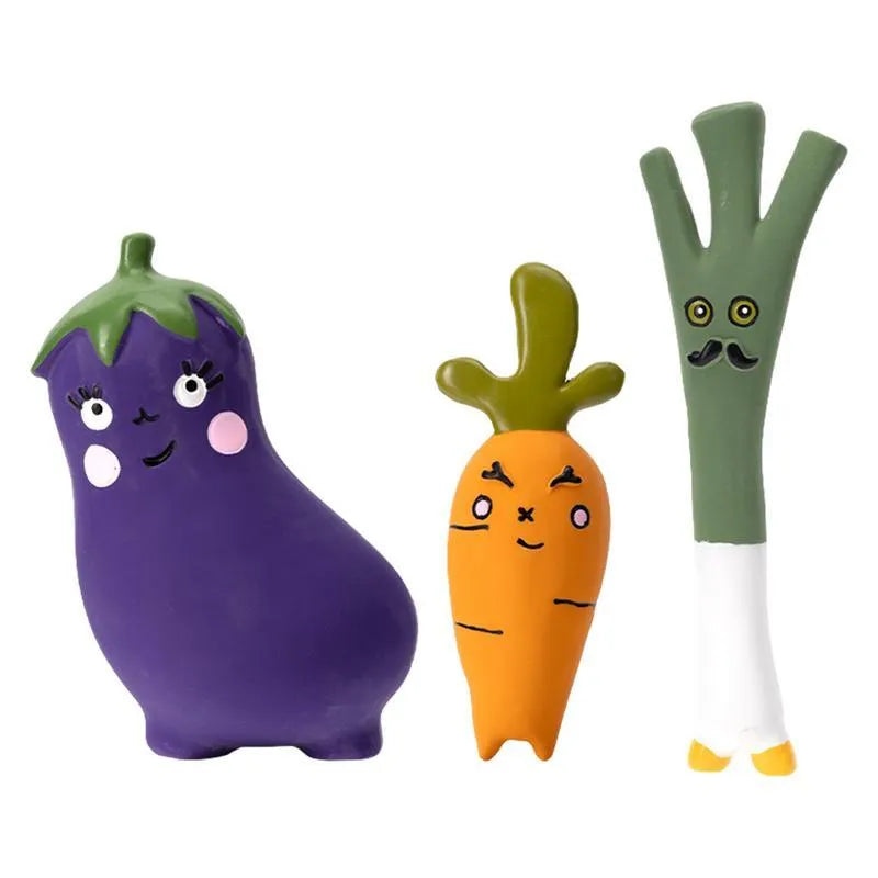 Latex vegetable dog chew toy in cartoon onion and eggplant shapes, green orange purple colours
