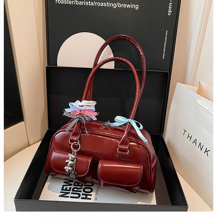 PU leather women's pillow handbag with flap closure and double shoulder straps in retro design
