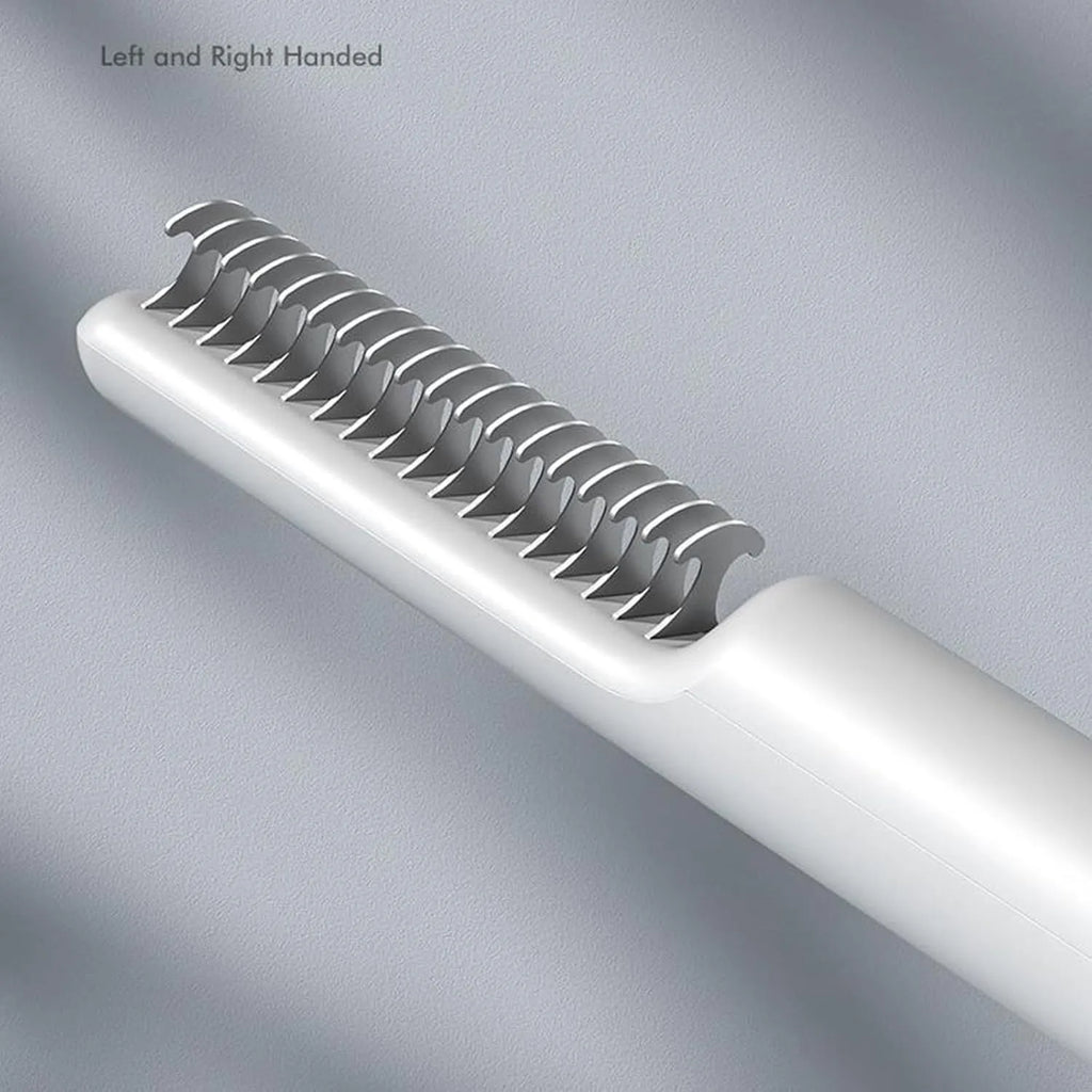 Stainless steel pet dematting comb with user-friendly handle on a pink background.