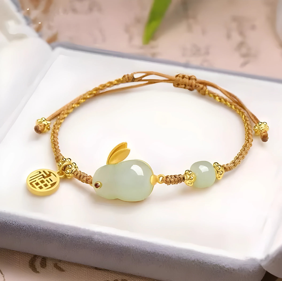 Hetian jade rabbit bracelet with geometric charm on yellow adjustable string