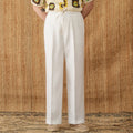 Linen high-waisted trousers with elasticated waist and lace trim in a straight-leg, loose fit.