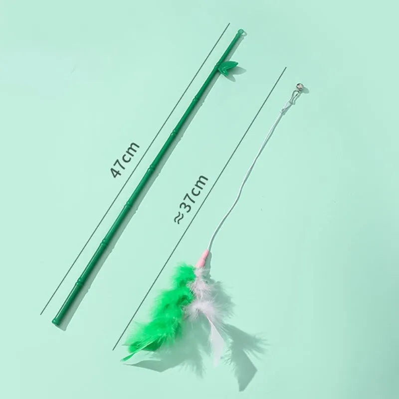Green interactive cat wand toy with feather and bell refills for feline play