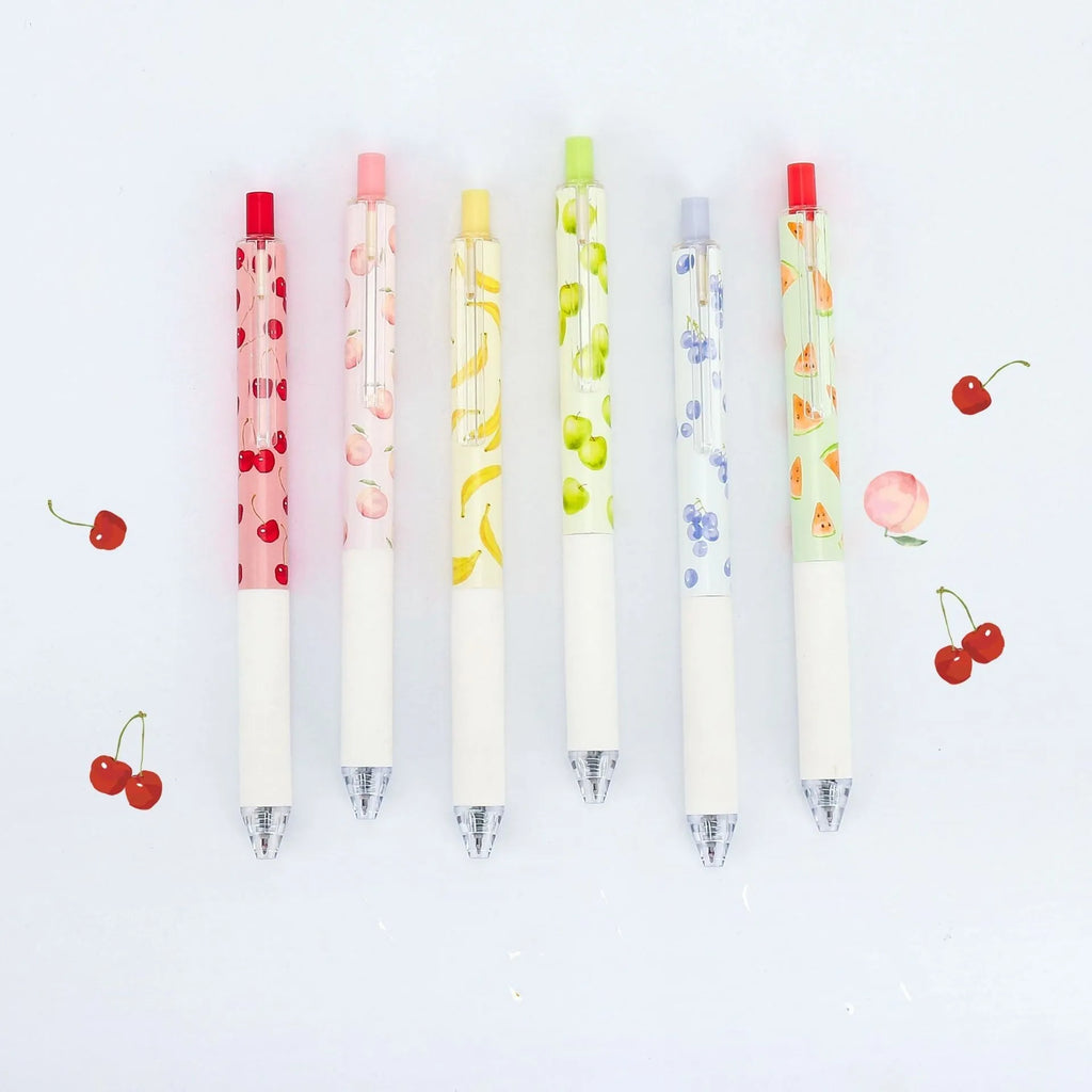 Three fruit-scented press-action pens with 0.5mm quick-drying black ink refills on writing paper