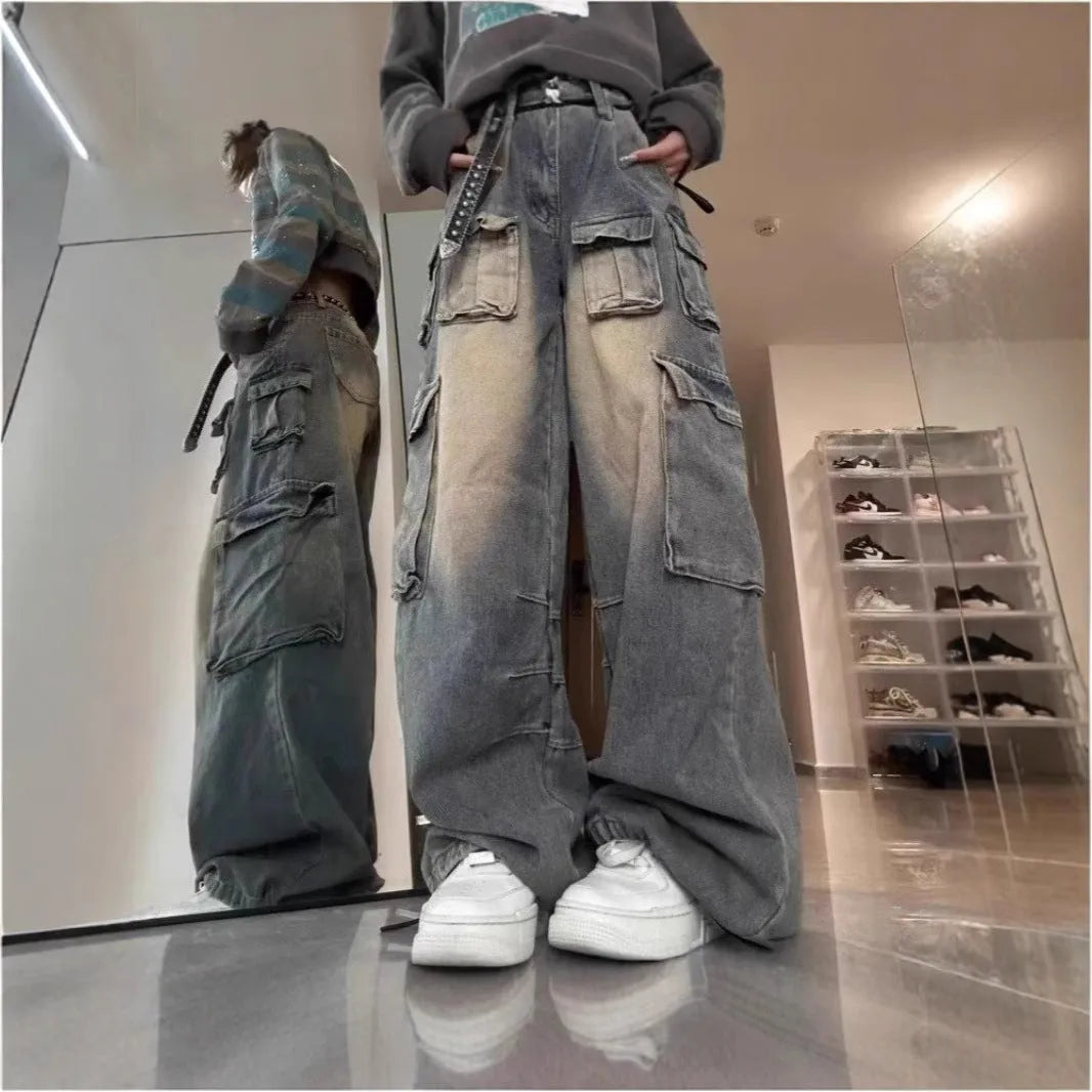 Light blue loose-fit denim jeans with multiple pockets and distressed finish