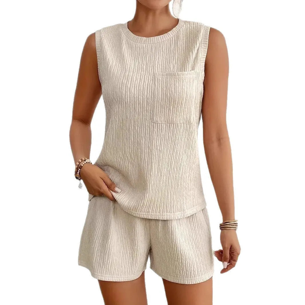 Solid colour sleeveless round neck vest and matching shorts set for women in apricot.