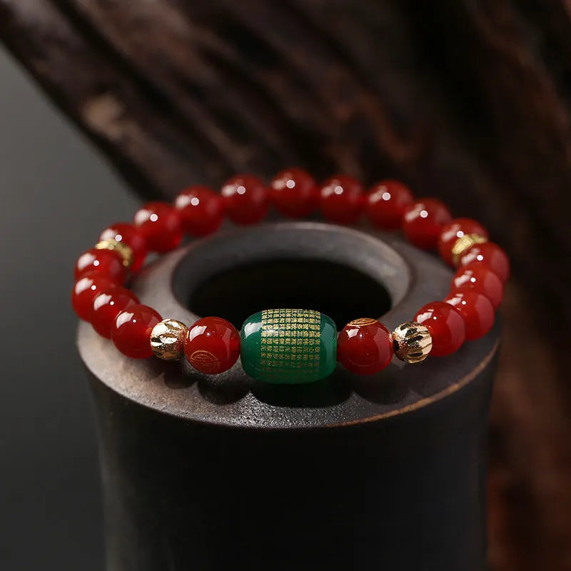 Red agate Guanyin bracelet with auspicious patterns in new Chinese style, showing Buddhist prayer beads