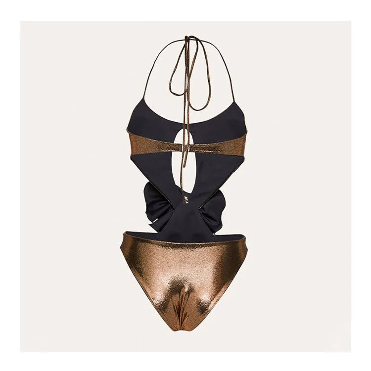 Gold coloured one-piece halterneck swimsuit with hollow-out details on a mannequin.