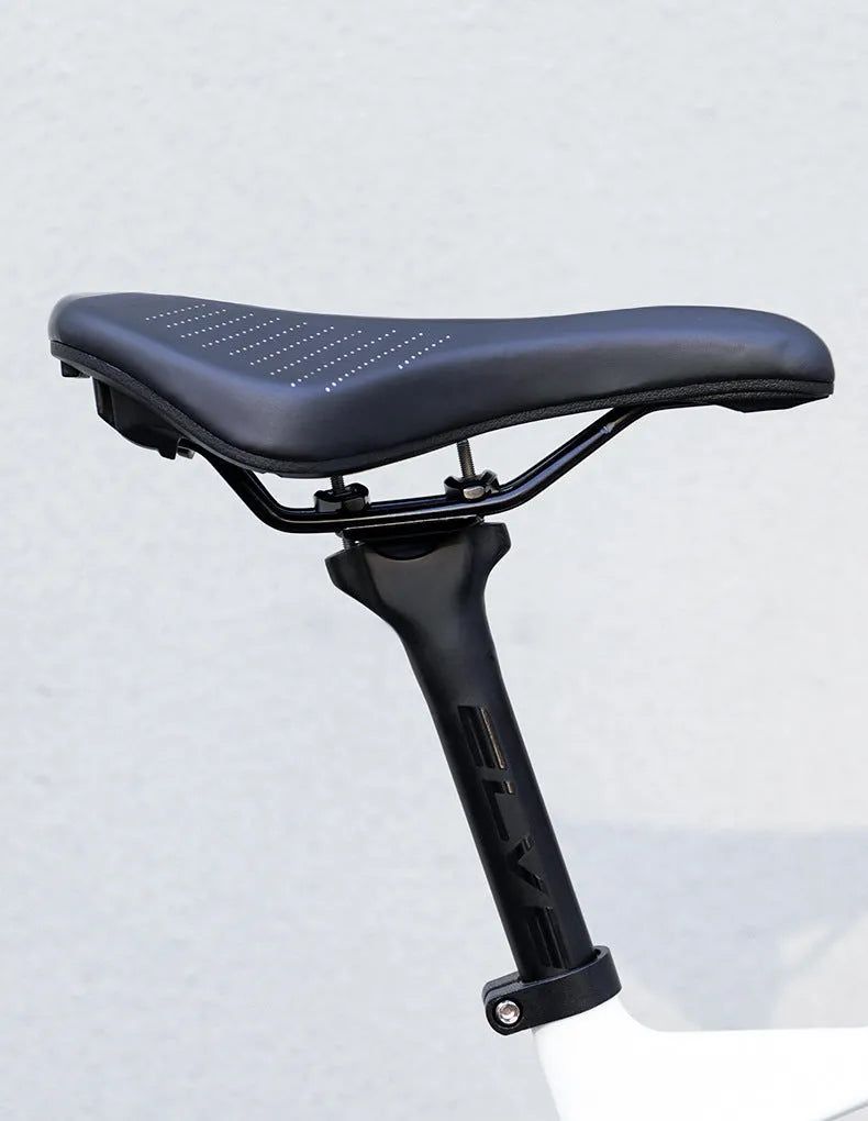 Black and pink bicycle seat cushion for mountain bikes and sports road bikes with PU foam construction