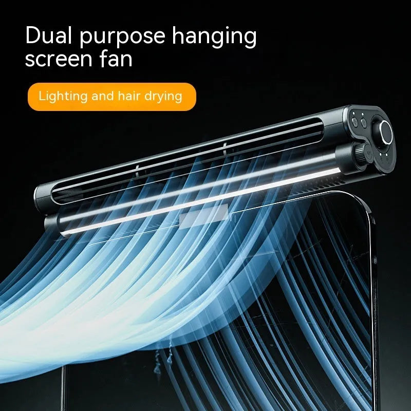 Black clip-on bladeless USB fan with LED lighting mounted on laptop screen showing compact design