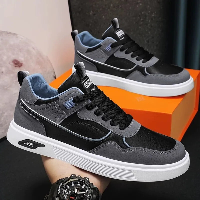 Men's low-top canvas board shoes in black, beige, and grey with mesh lining and leather stitching