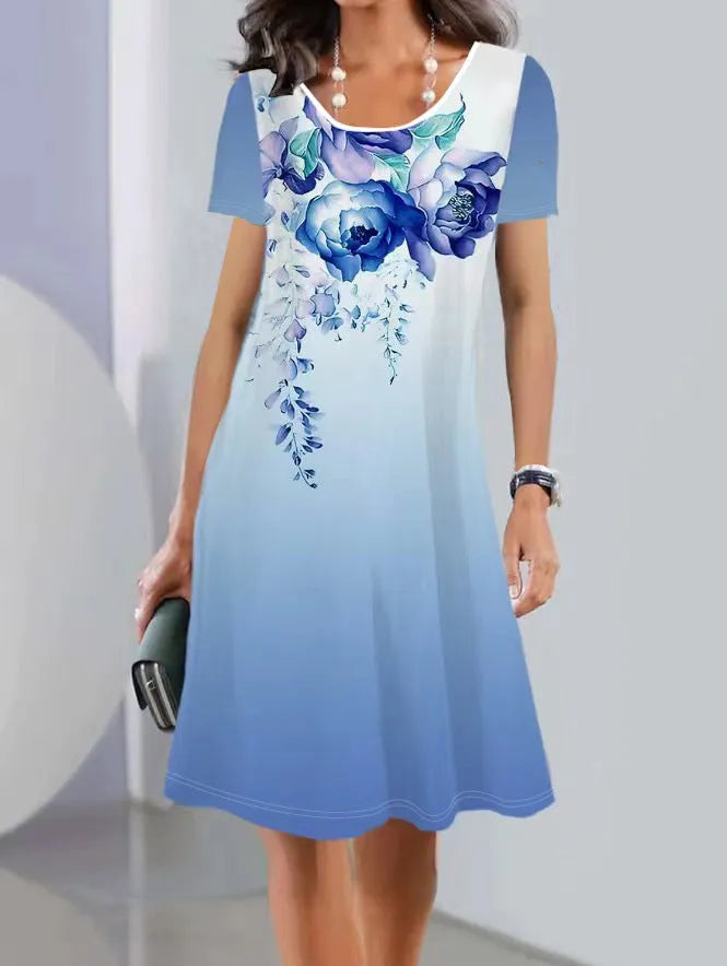Light blue summer dress with floral print, A-line mid-length skirt, round neck and short sleeves