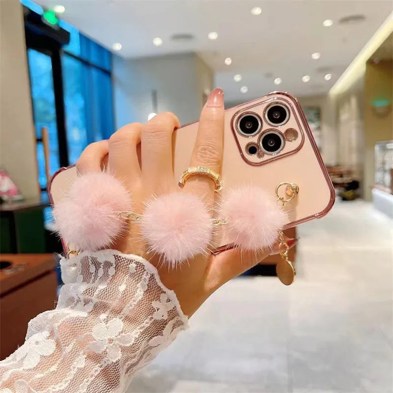 Soft silicone iPhone case with plush bracelet and holder, side love design, electroplated rear cover.