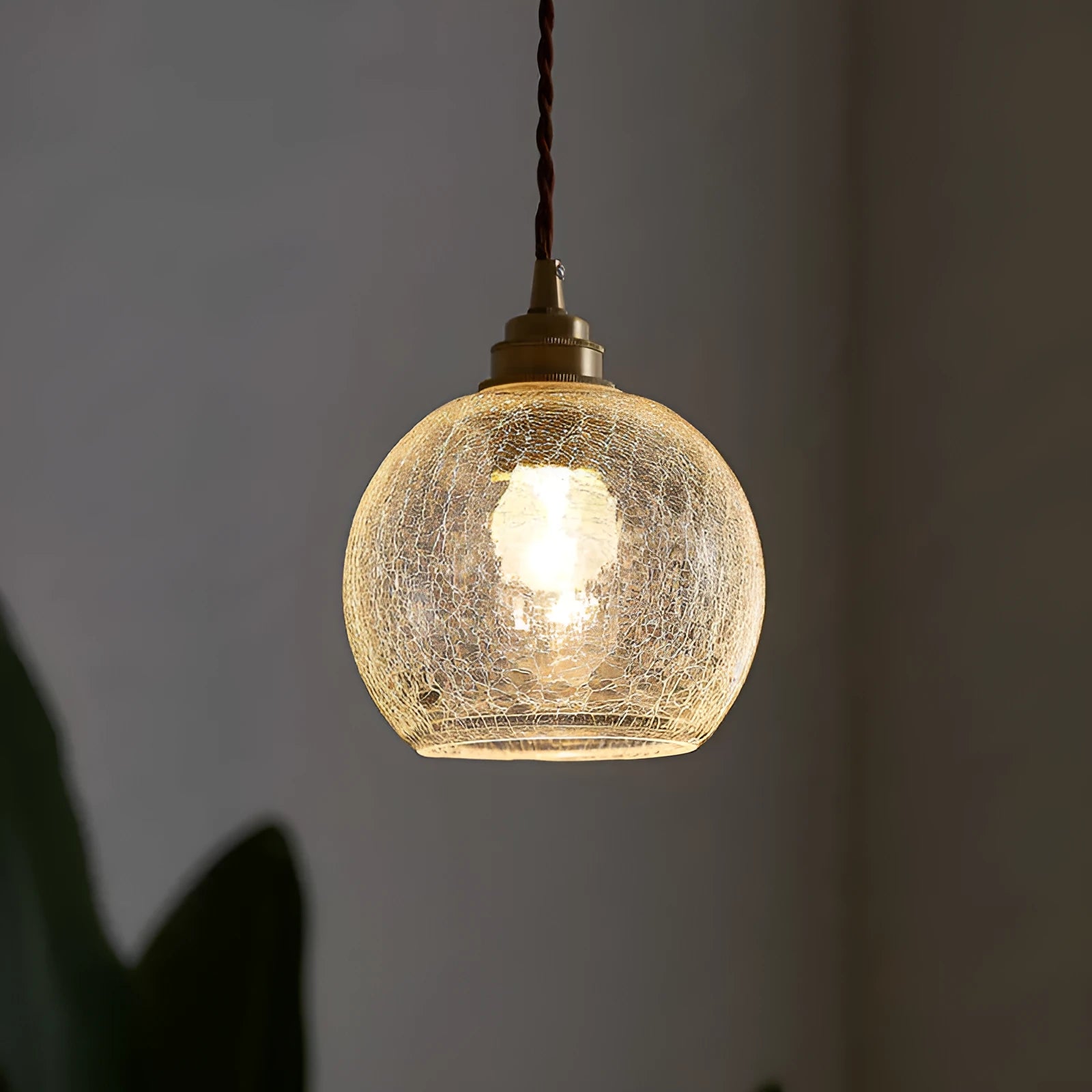Retro brass chandelier with glass ball shade measuring 17.5cm wide by 15cm high
