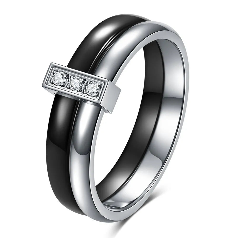Ceramic women's ring with 6mm band width and inlaid zirconium accents in geometric round design