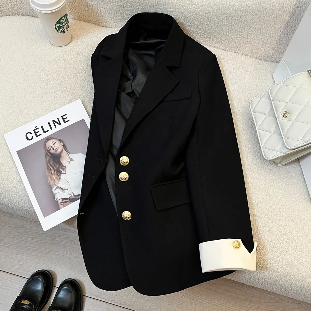 Korean-style loose fit women's trench coat in milky white with long sleeves and pockets.