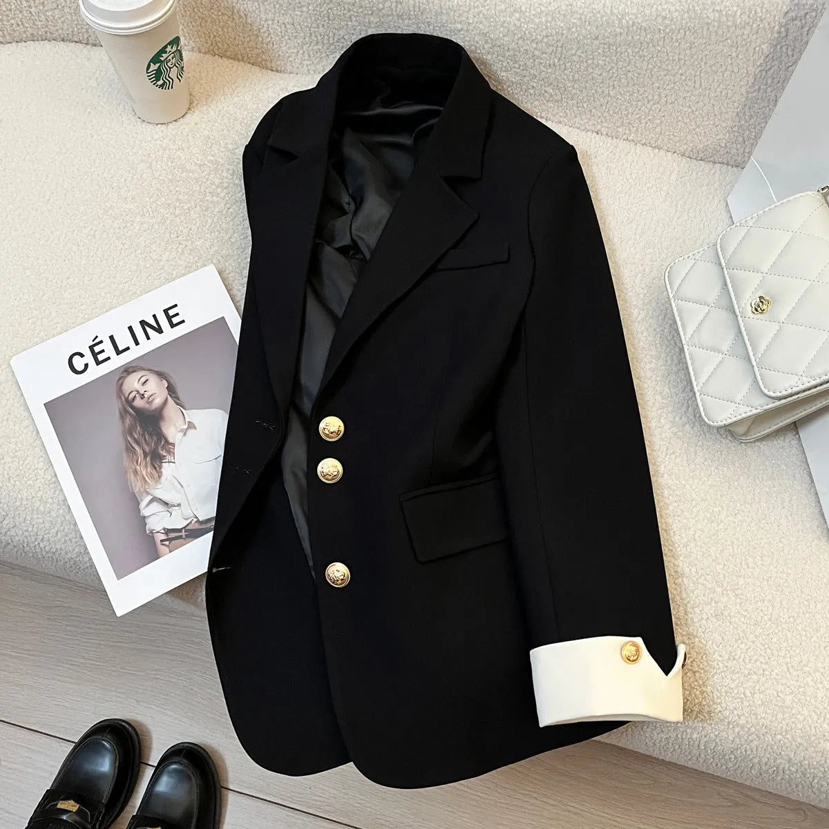 Korean-style loose fit women's trench coat in milky white with long sleeves and pockets.
