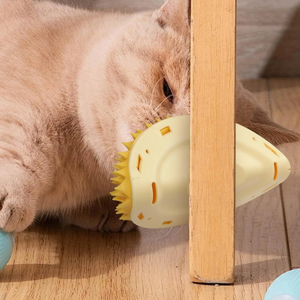 Yellow durian-shaped cat corner scratcher and groomer mounted on a wall