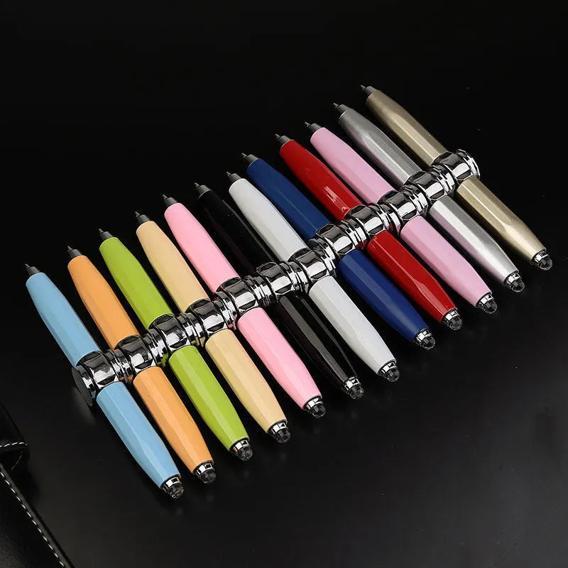 Metal multi-function LED pen with spinning gyro component and ballpoint refill.