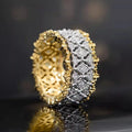 Geometric copper ring with gold electroplate and round zircon stone in two-tone finish