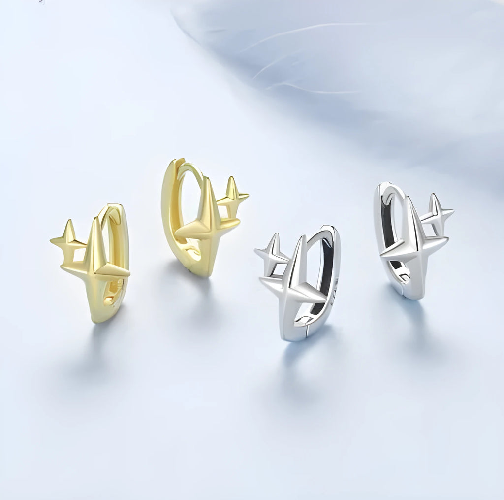 Minimalist silver star clip earrings with geometric design and oxidised finish