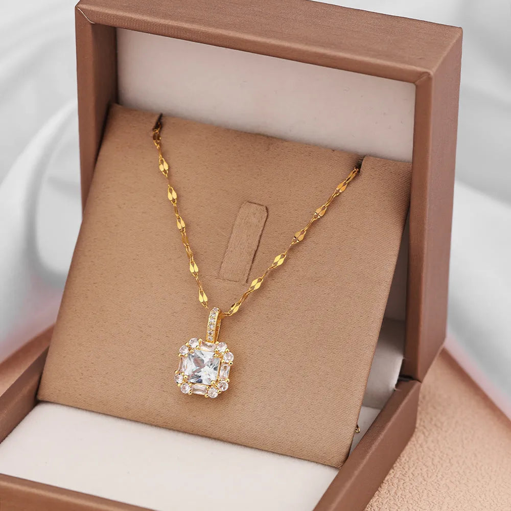 Gold titanium steel necklace with geometric quadrilateral pendant featuring mixed gemstone inlay on water wave chain
