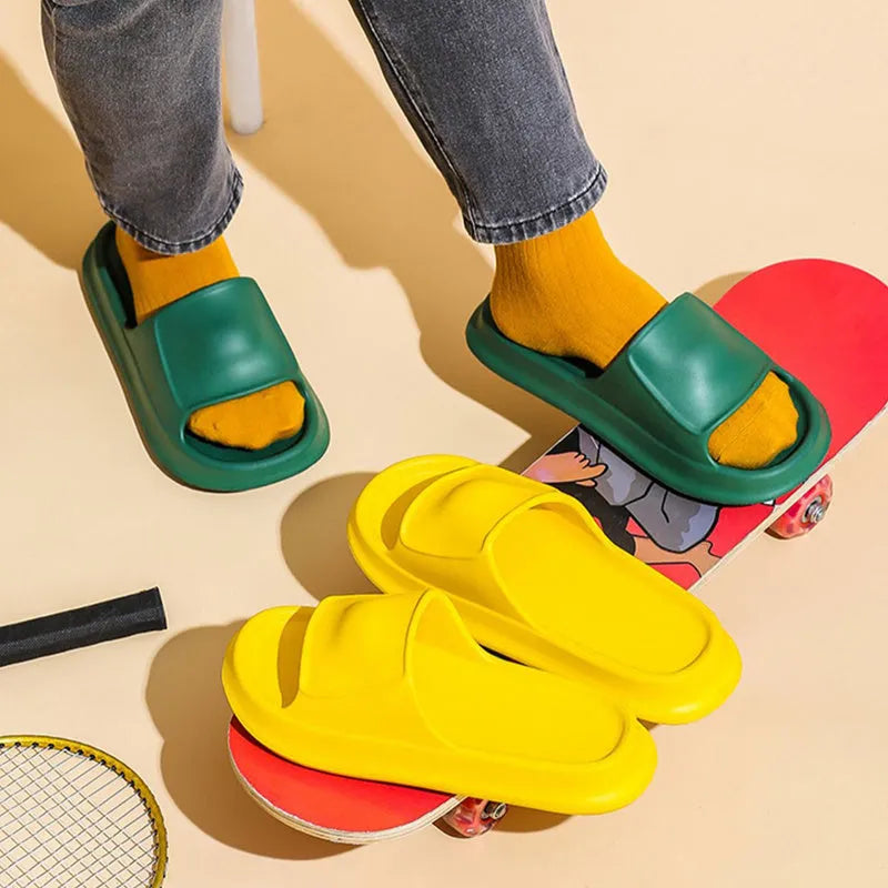 Thickened EVA flip-flop slippers in multiple colours showing the sole thickness.