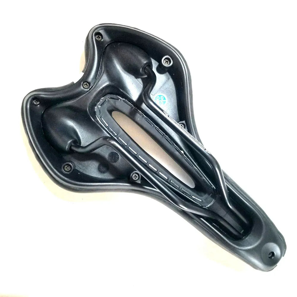 Bicycle cushion saddle with silicone padding and waterproof cover alongside wrench and tire patch accessories