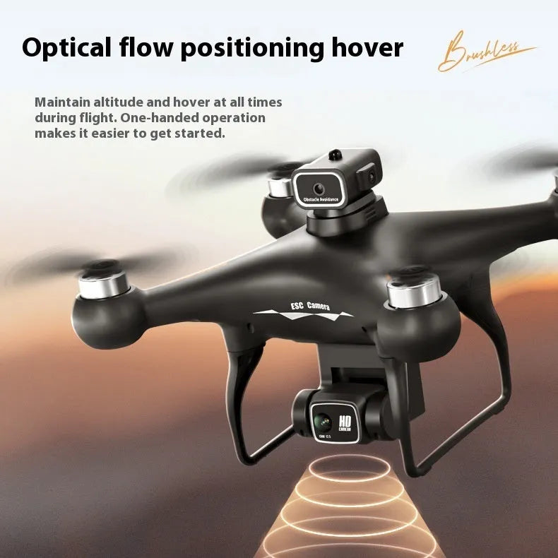 Black plastic UAV drone with four propellers and camera, remote control transmitter beside it