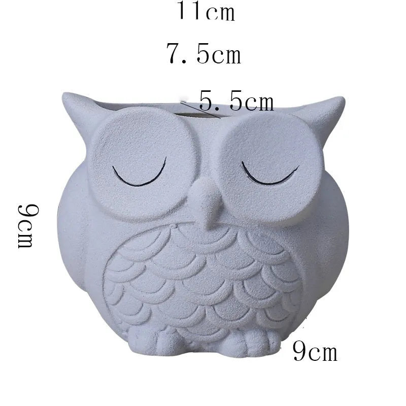 Handmade frosted ceramic owl succulent pot in light pink, measuring 11cm tall.