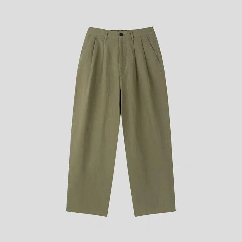 Men's apricot-coloured wide-leg cotton linen blend trousers with a mid waist and pencil pant cut.