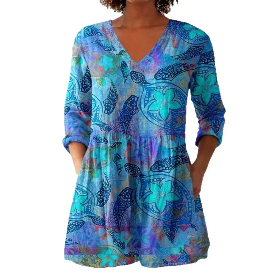 Women's retro style slim fit long-sleeved top with a printed design, shown on a hanger.
