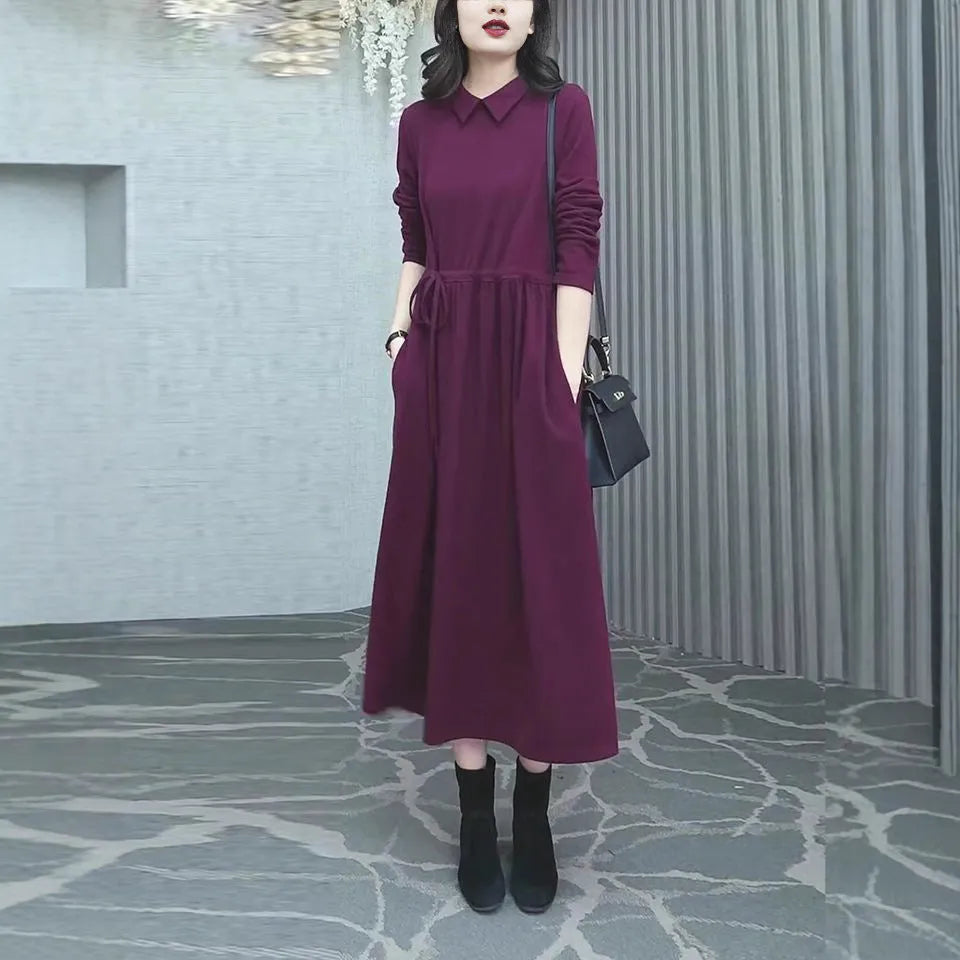 Purplish red long sleeve plus size dress for women, urban winter commute style.