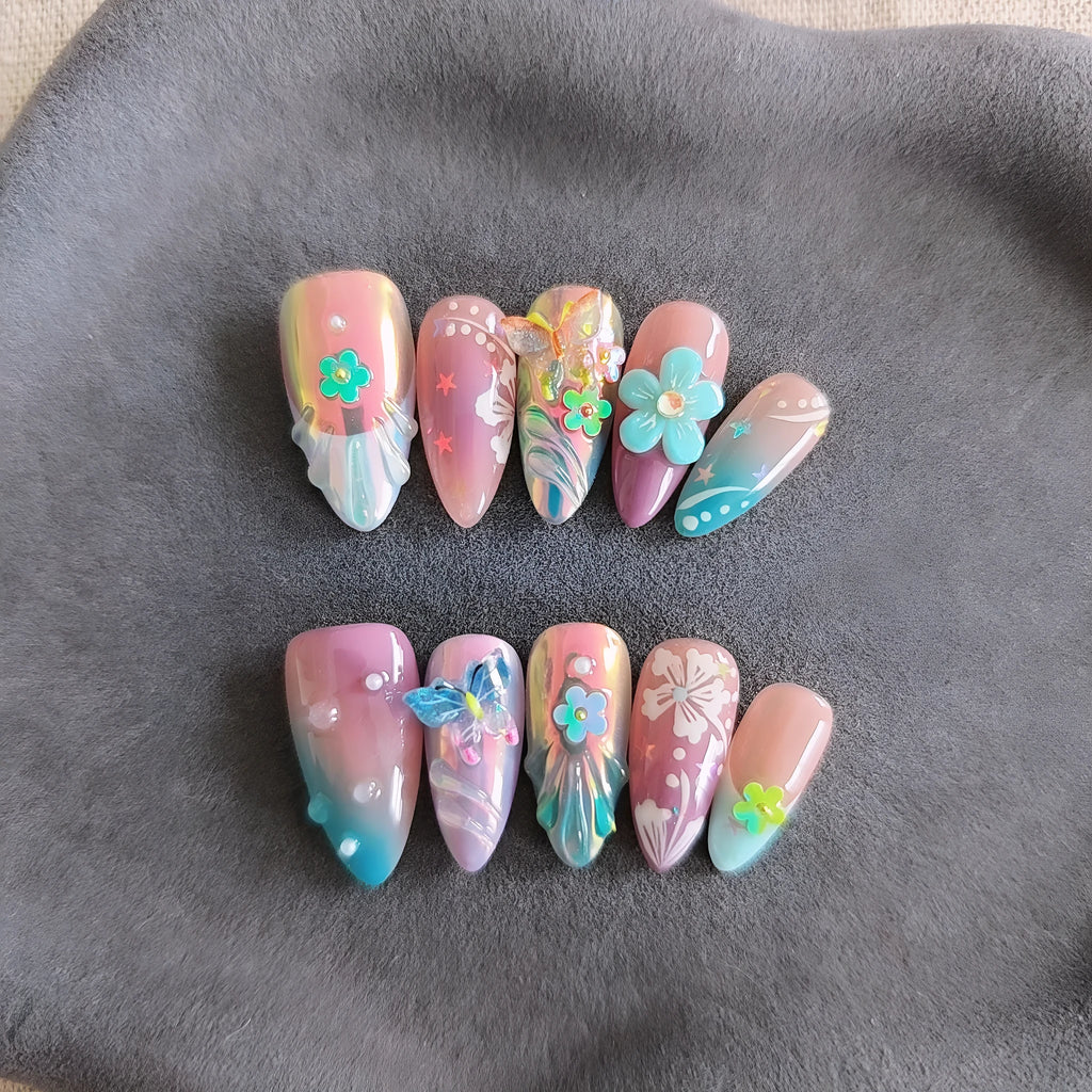 Handmade colourful floral and butterfly nail decorations set with embossed patterns in four sizes