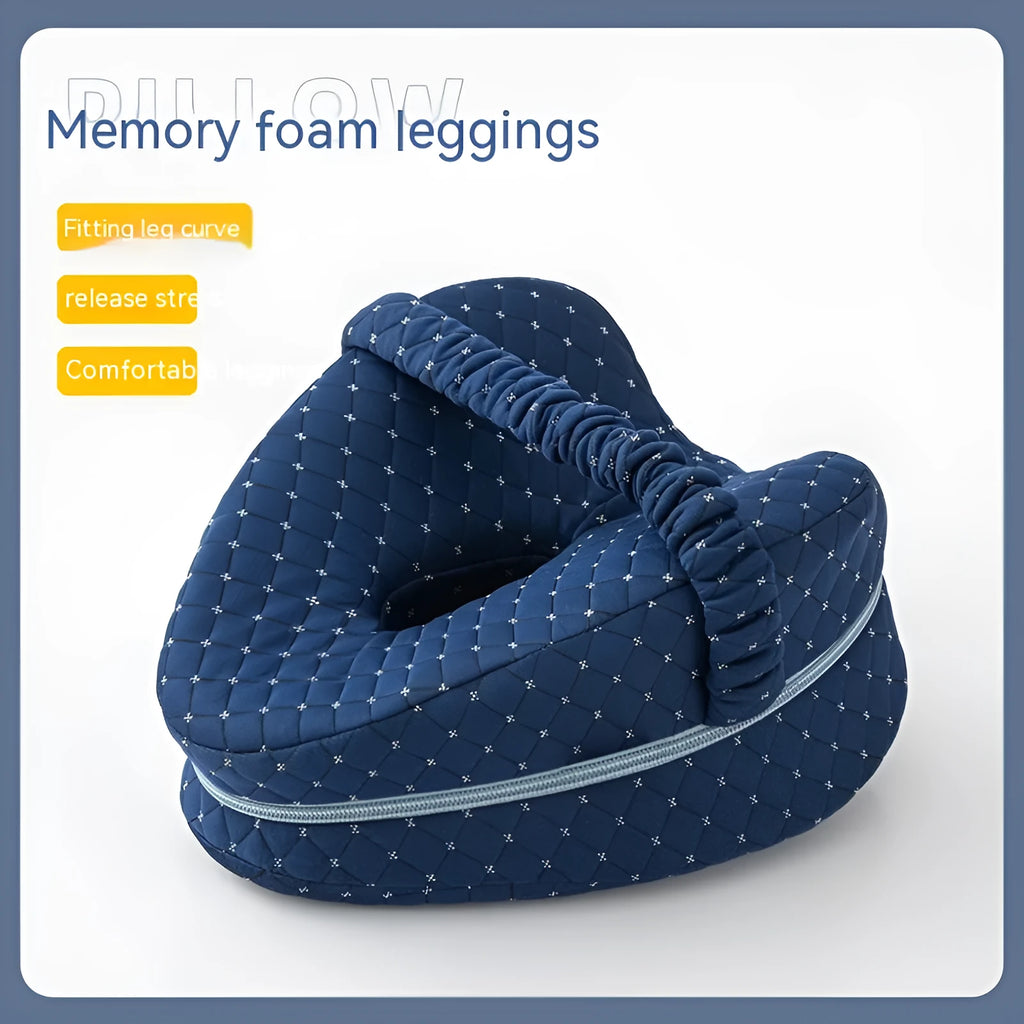 Love heart-shaped dark blue jacquard memory foam leg pillow on a bed.