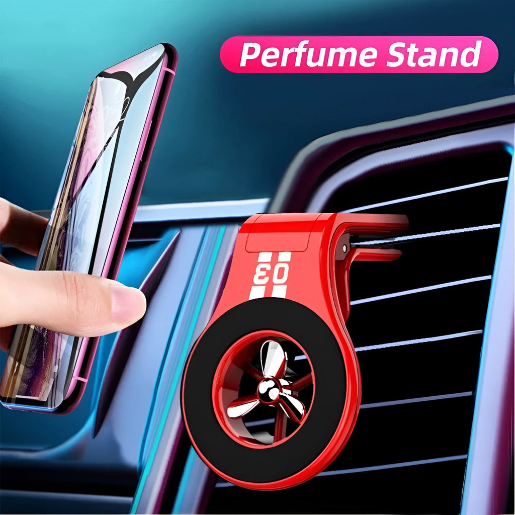 Black magnetic car phone holder attached to a car air vent, holding a smartphone at an angle.