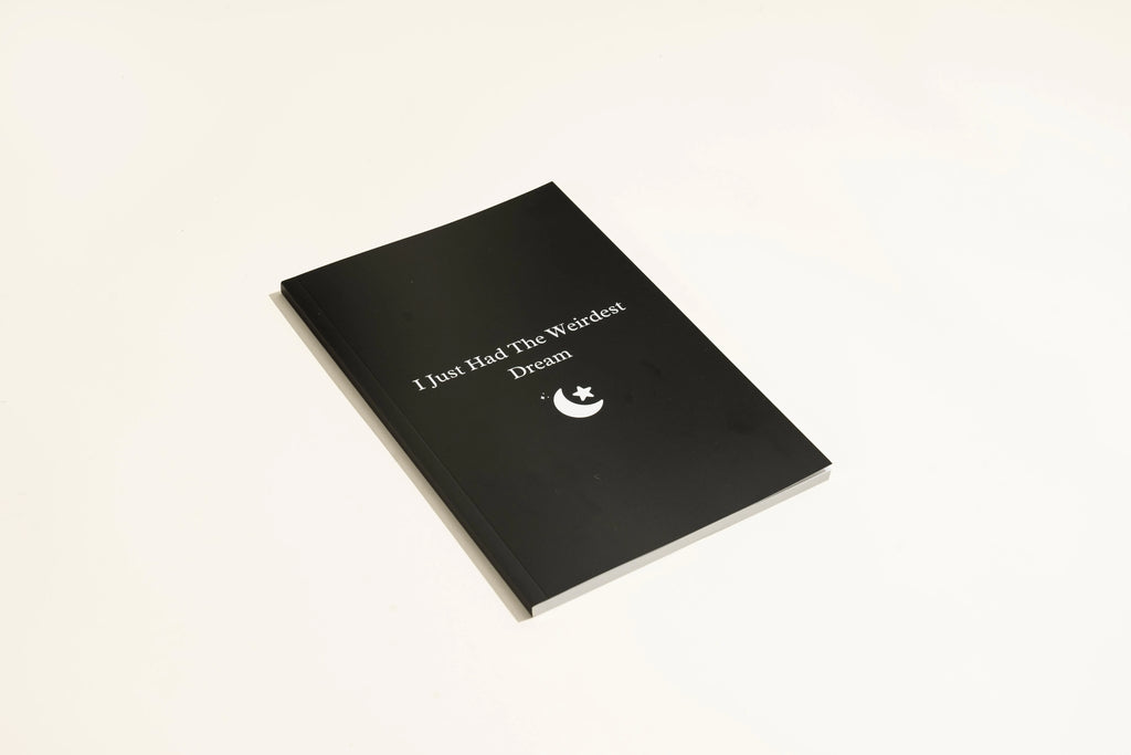Black hardcover Dream Journal notebook with business simplicity style.