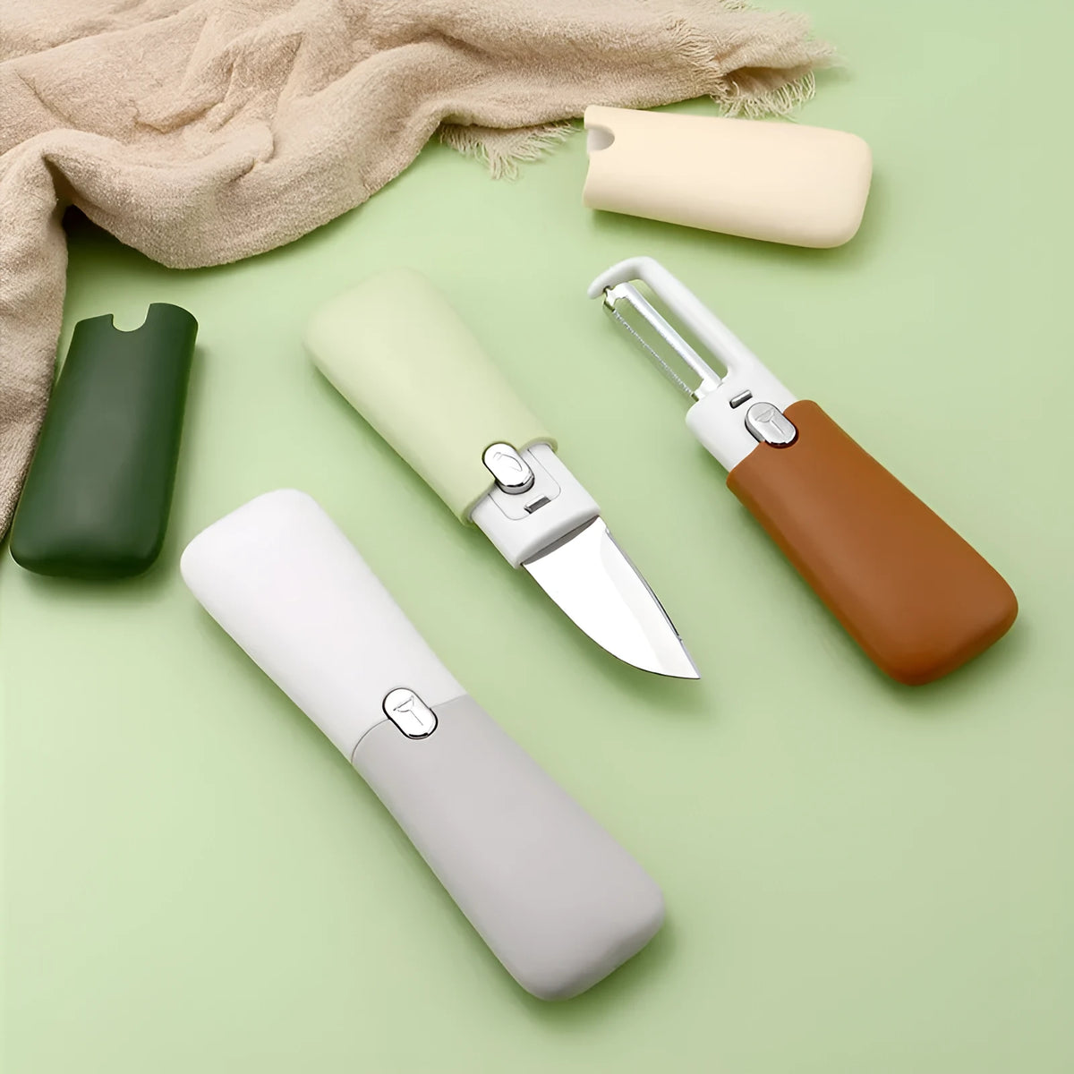 Multi-functional 2-in-1 stainless steel peeler with paring knife in avocado green, vibrant orange, or elegant grey