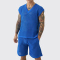 Men's blue V-neck sleeveless vest and matching shorts sports outfit on a hanger.