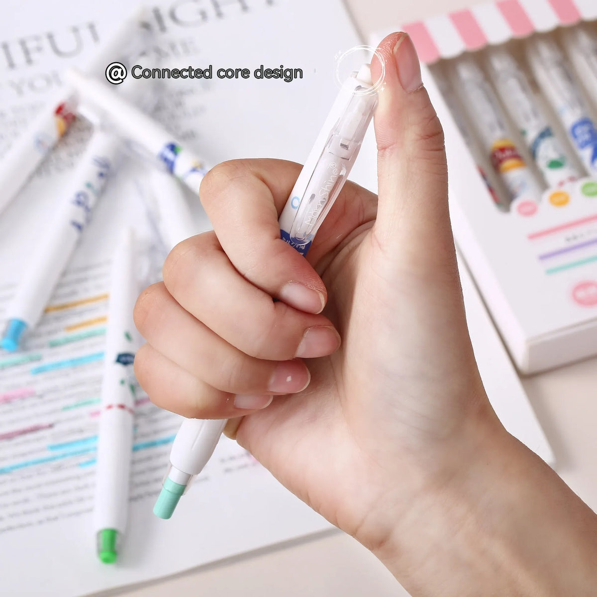 Boxed set of six fluorescent highlighter pens with plastic shells and oblique heads in three colour options