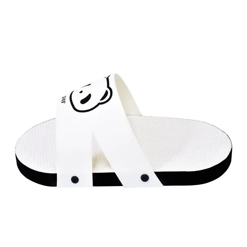 White slipper-style corrugated paper cat scratch board lying flat.