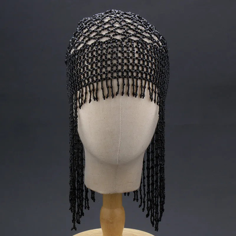 Handmade alloy belly dance hat with tassels and decorative mesh panels.