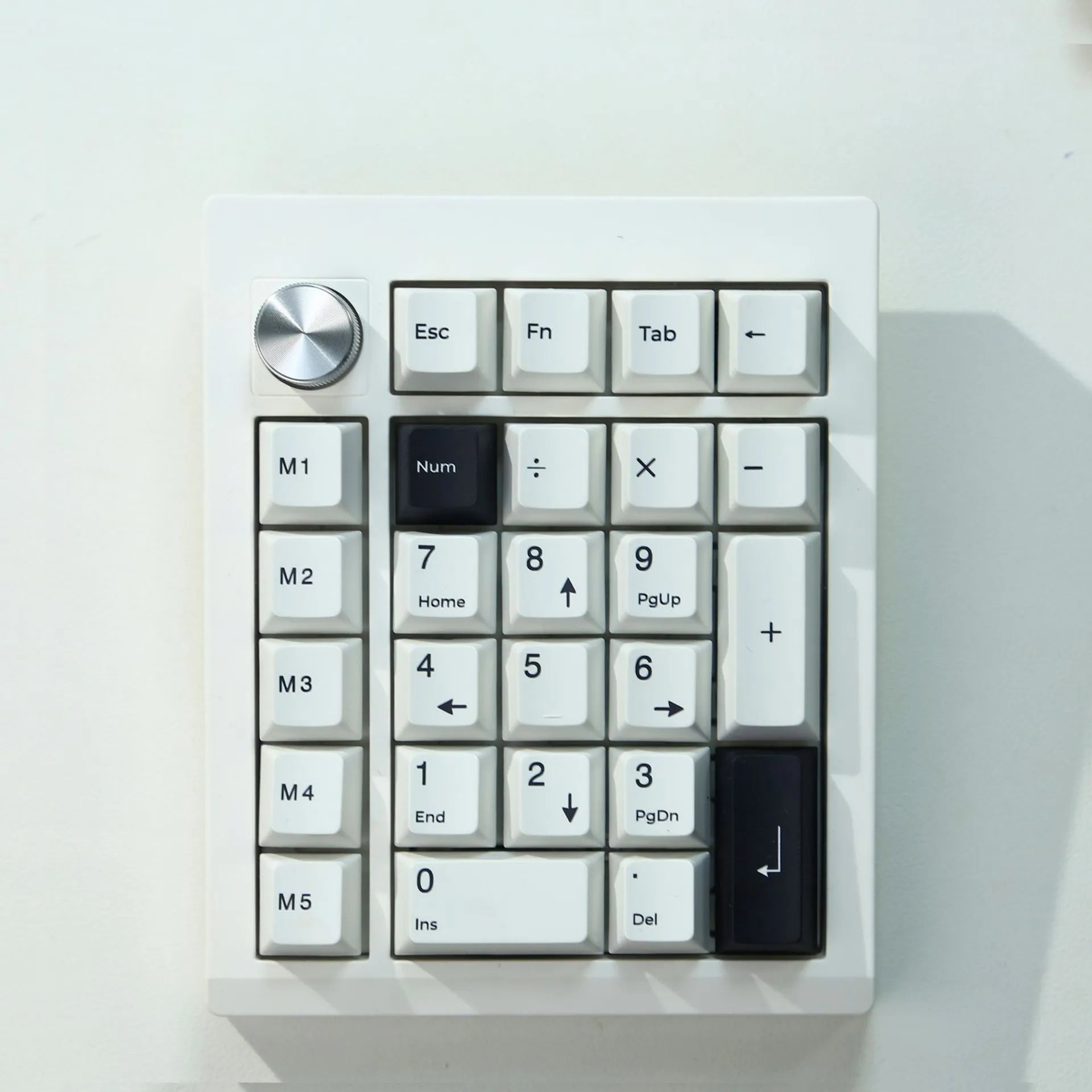 Wireless mechanical keyboard with numeric keypad in black colour showing three connection modes