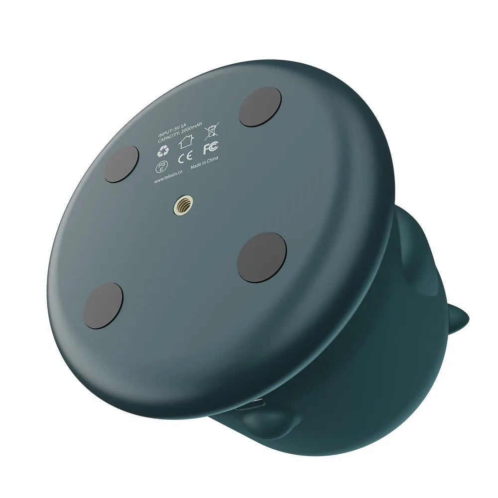 Dark green intelligent follow-up gimbal with AI face recognition showing smartphone mounting