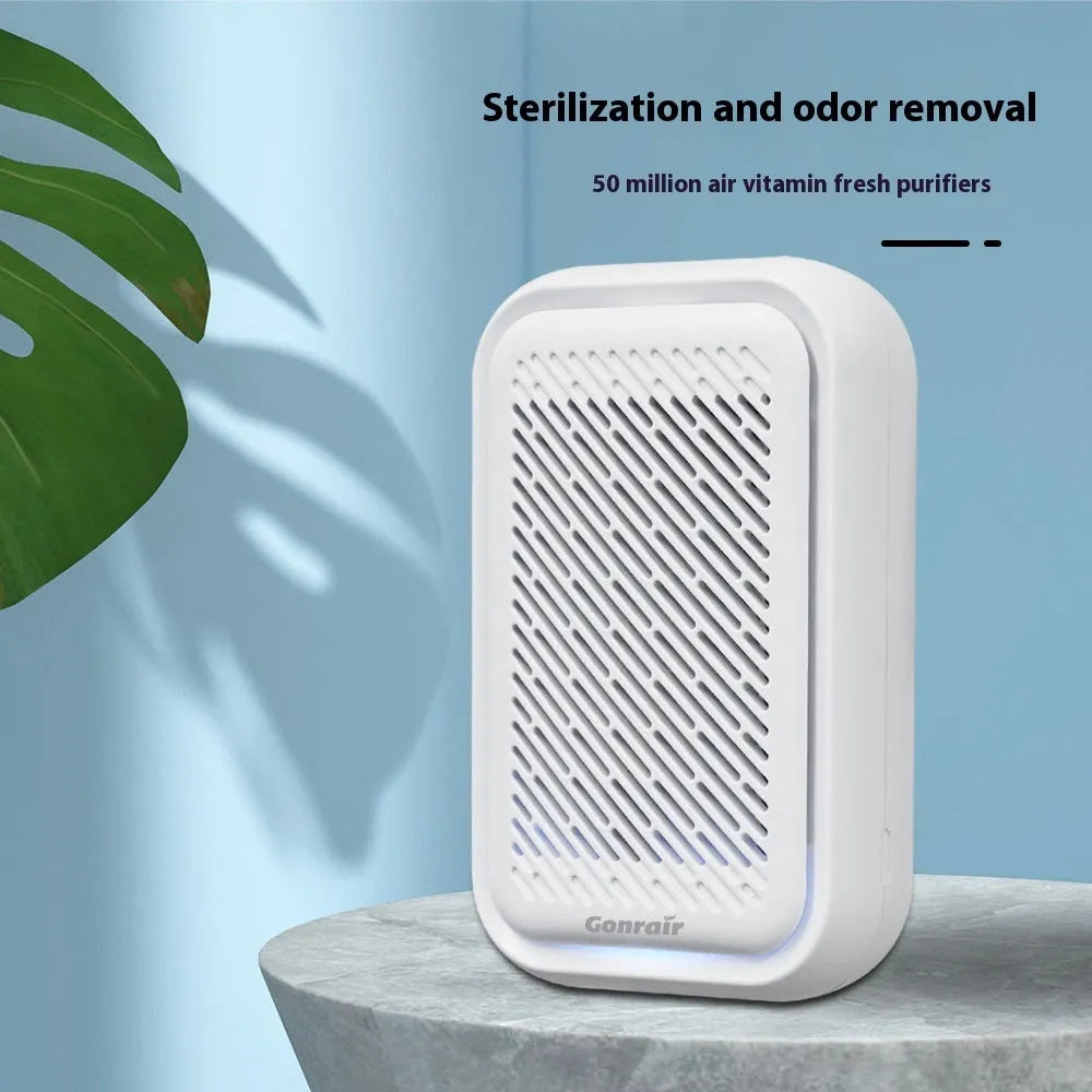 White wall-mounted air purifier with direct plug-in power cord and filter screen