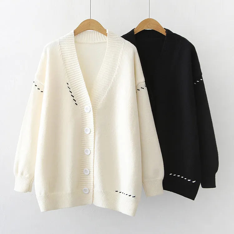 Women's loose fit knitted cardigan top coat in black or white with long sleeves